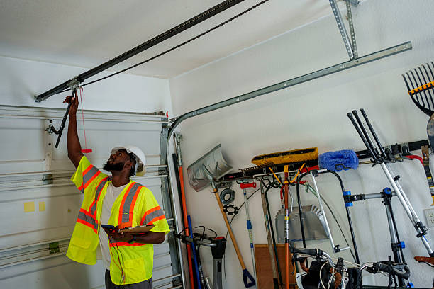 Professional Garage Door Panel Replacement technician working in Moundridge, KS